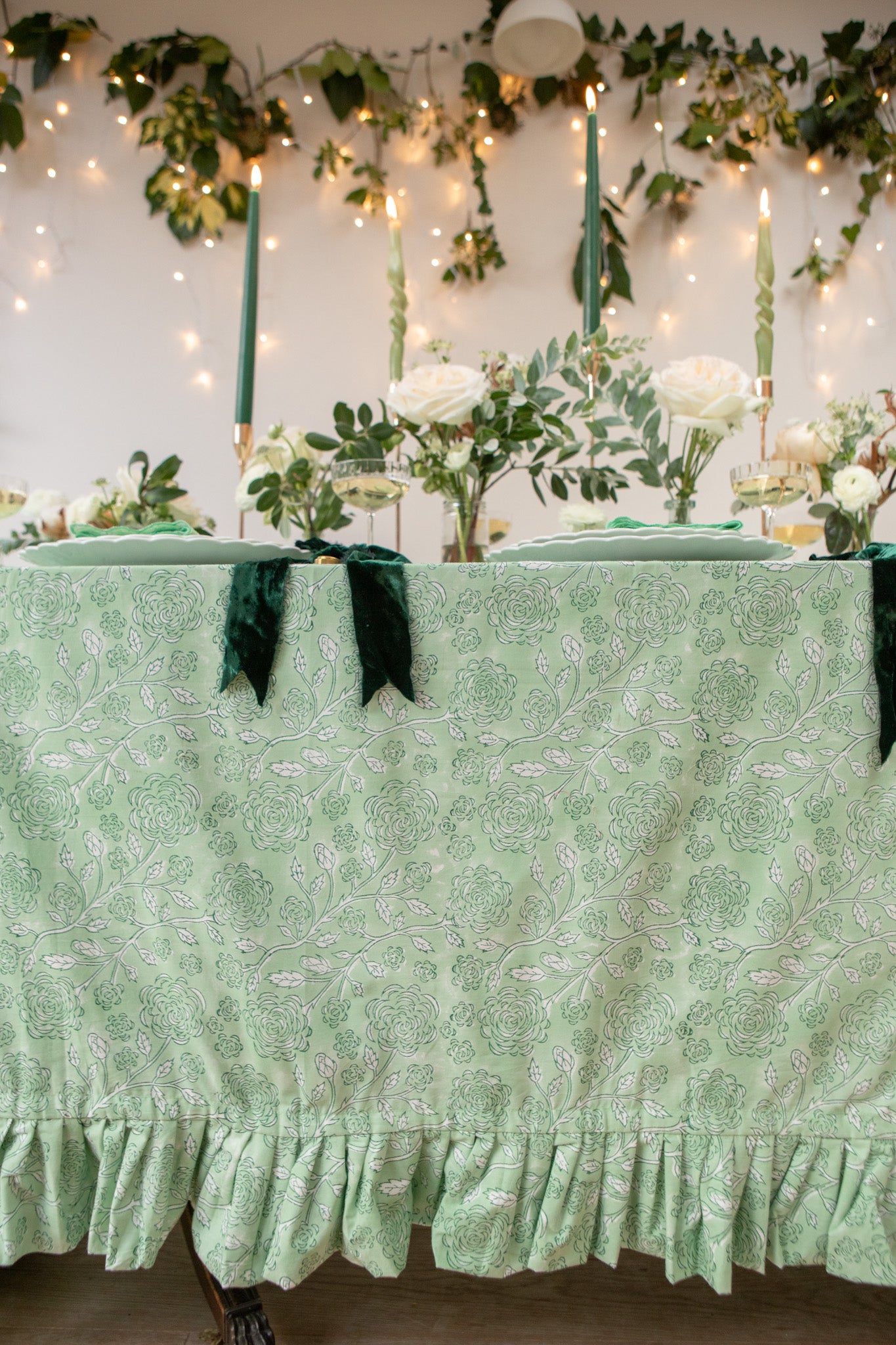 Green floral tablecloth blockprinted by Rosanna Falconer ruffle side