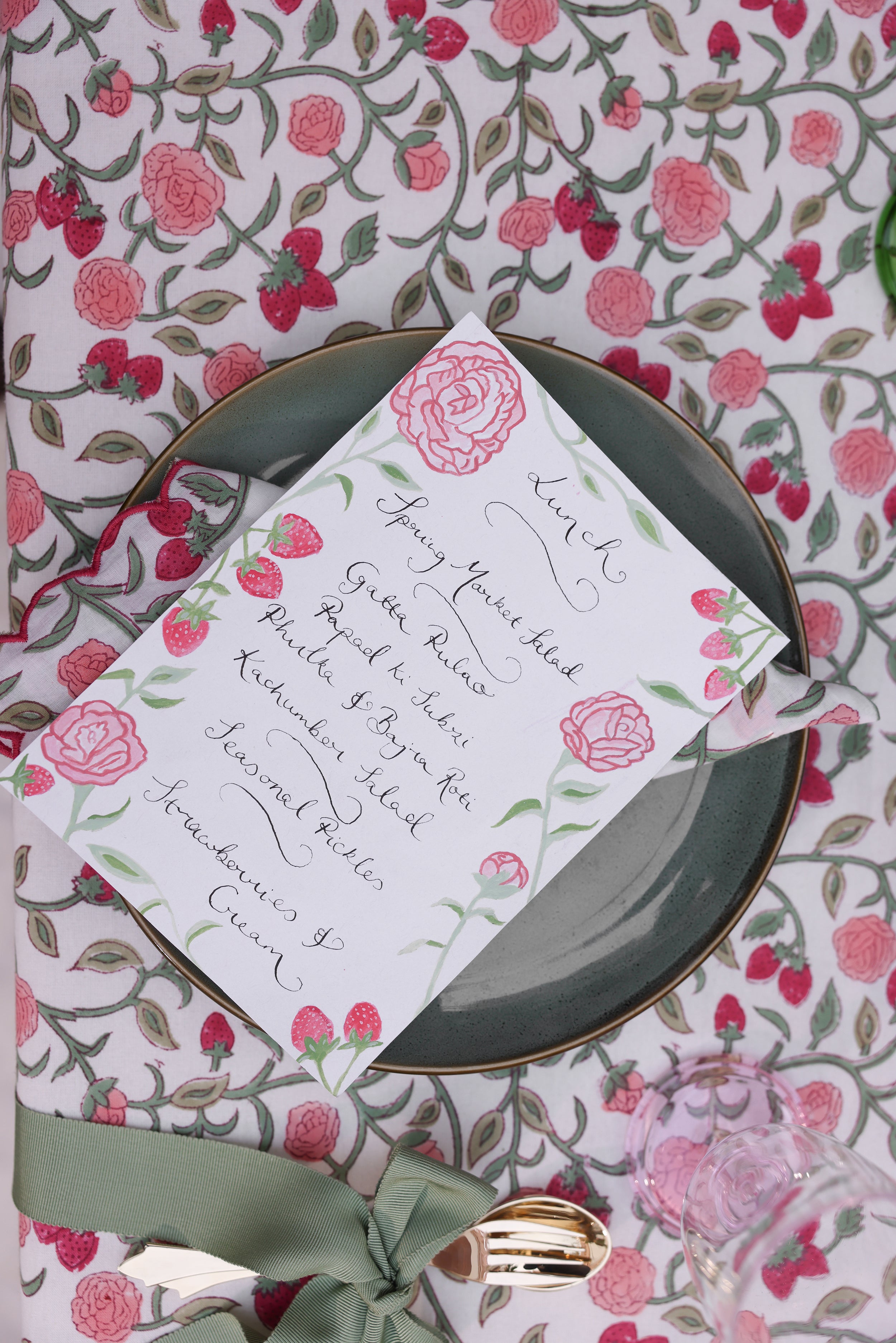 Menu on roses and berries table