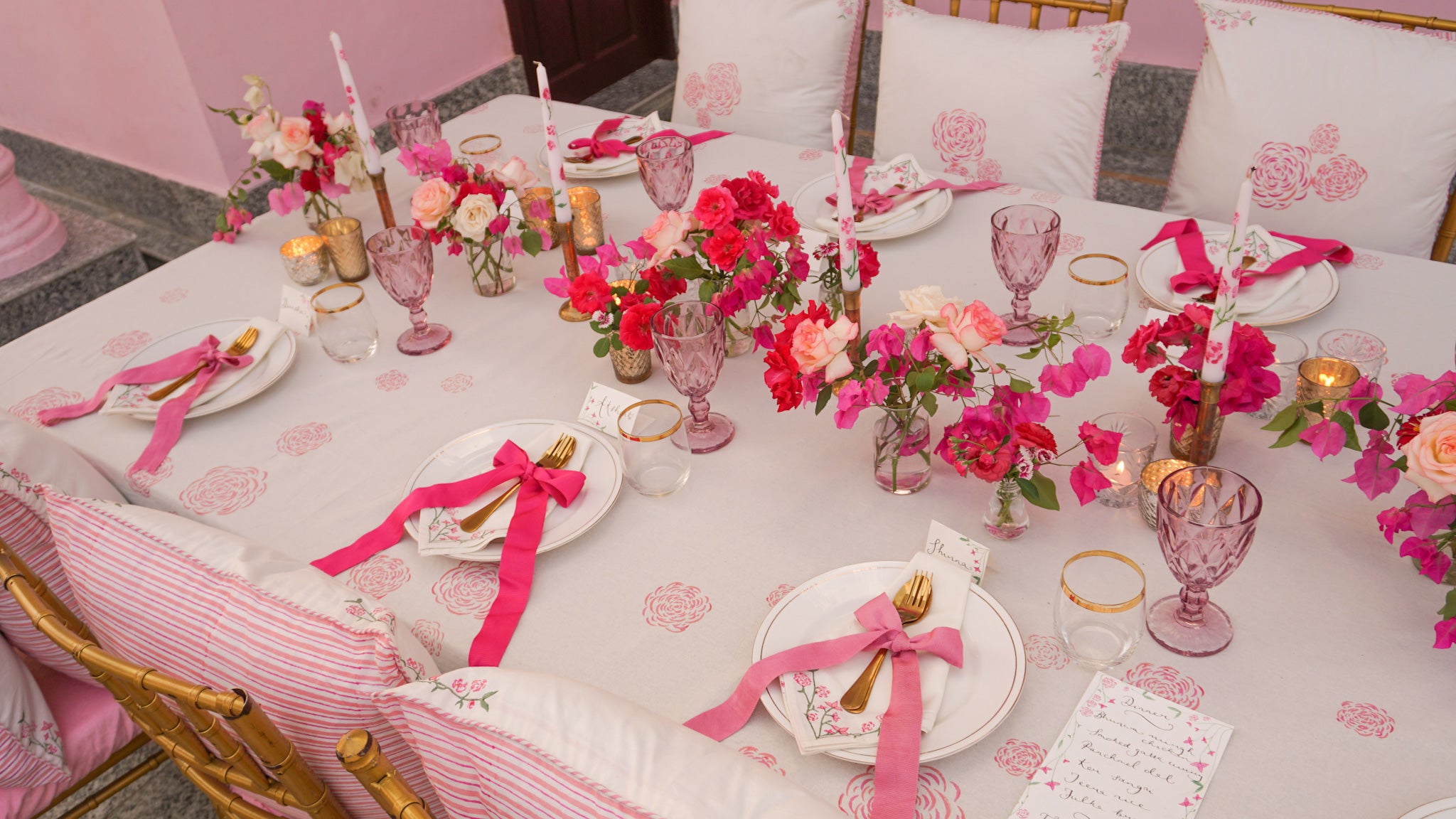 Pink tablescape with roses and bougainvillea