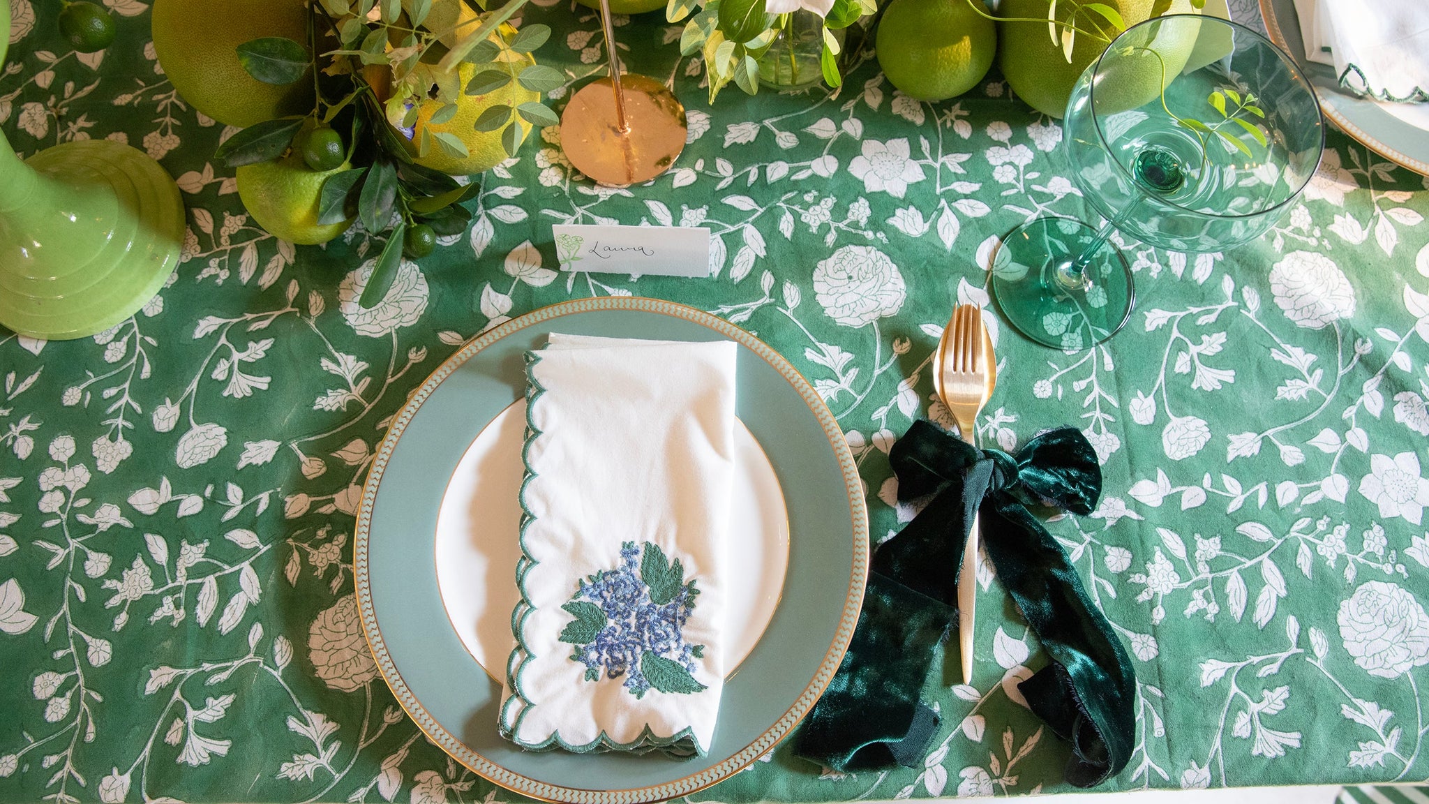 Dahlia block printed tablecloth with dahlia flowers and tall autumn colour candles