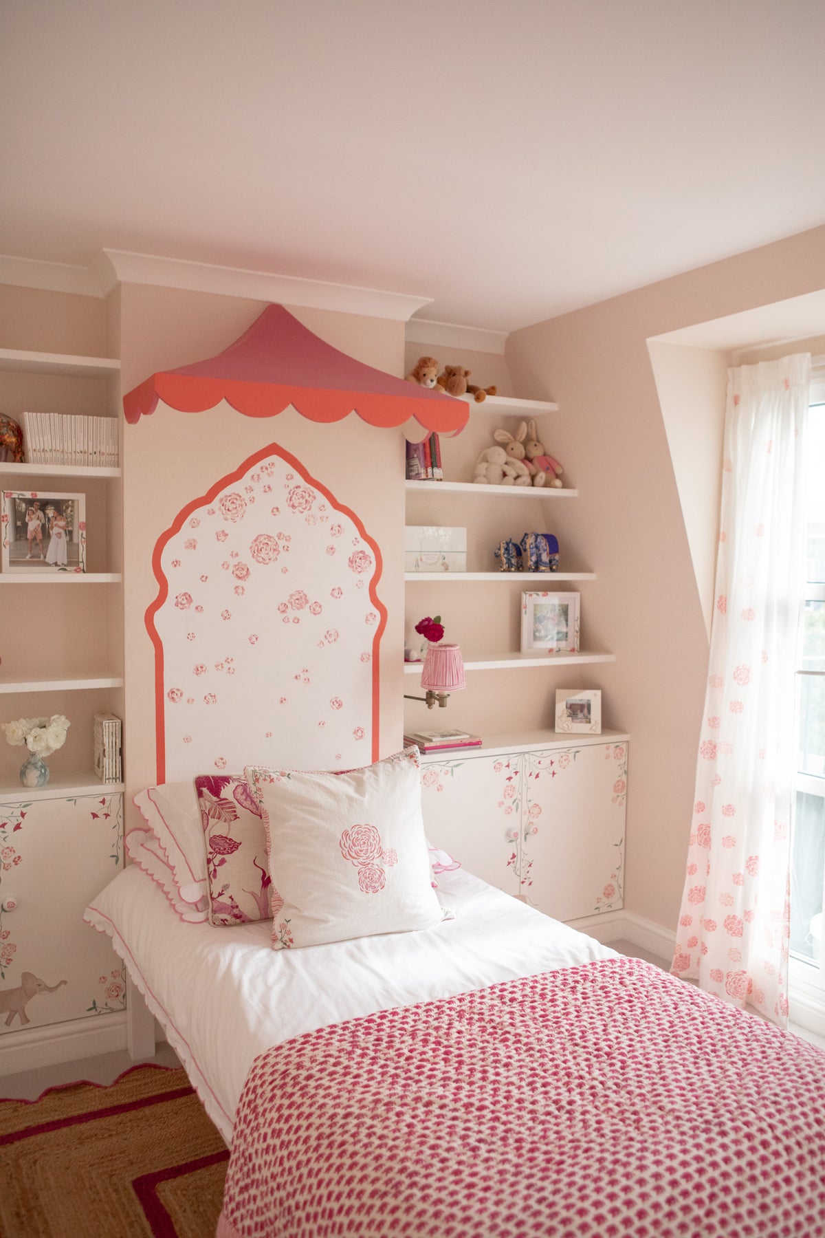 Child's bedroom with wooden painted canopies