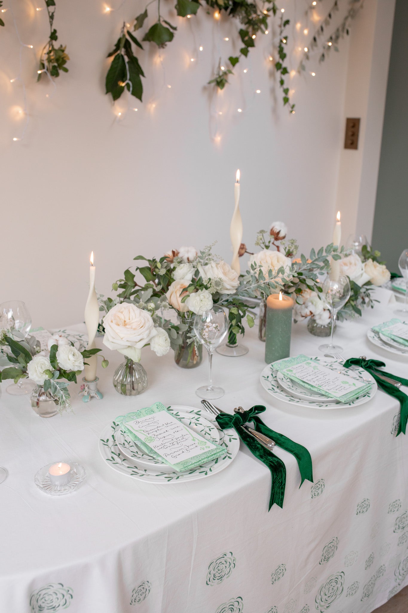 Detail of Christmas green and white tablescape