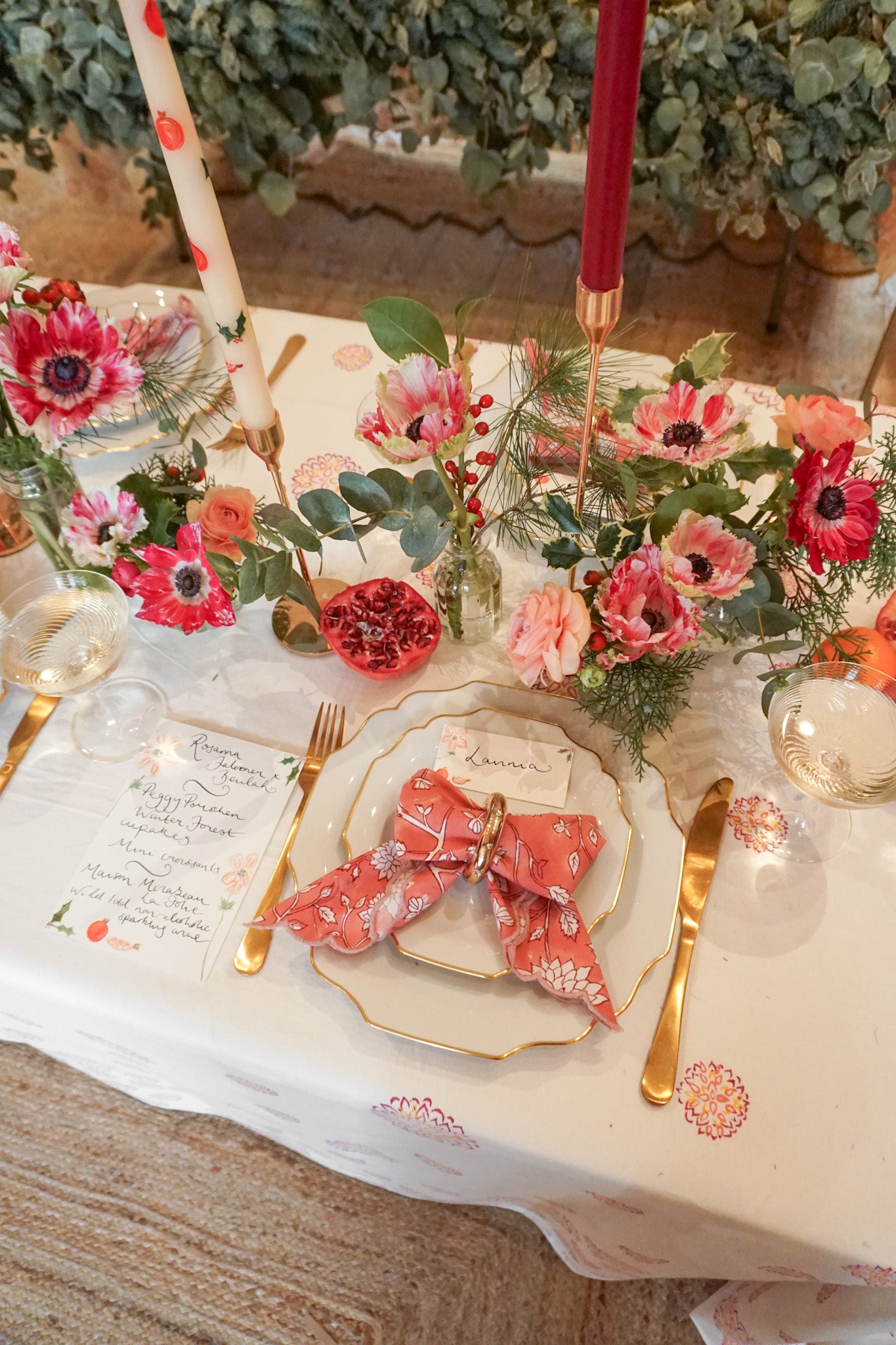 Details of festive tablescape with napkin bow