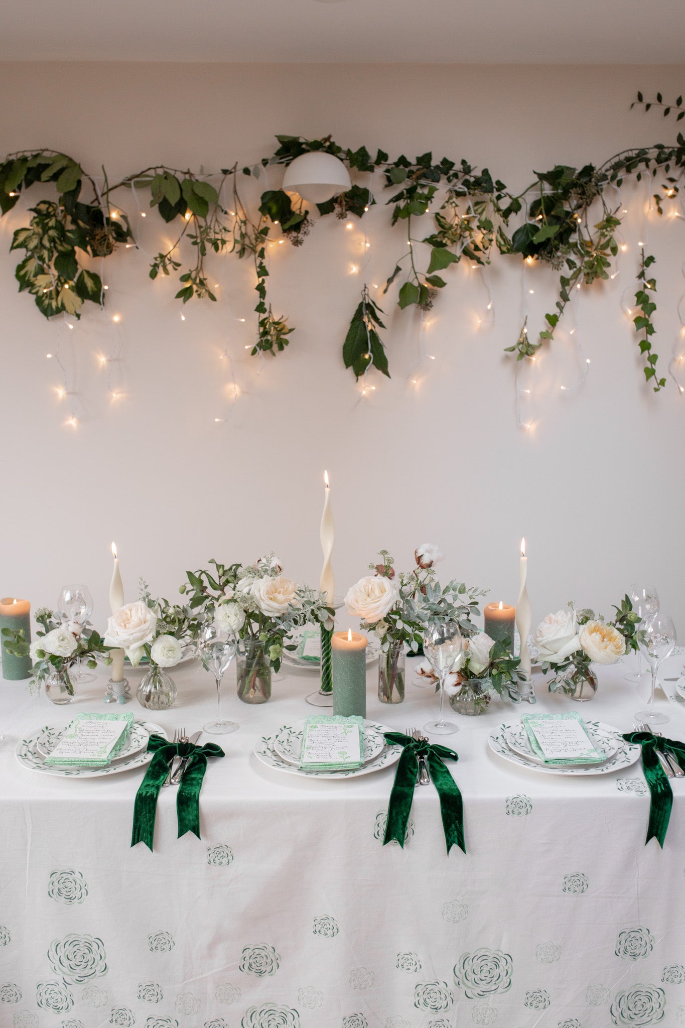 Green Jaipur Bloom block print tablecloth for Christmas with velvet bows