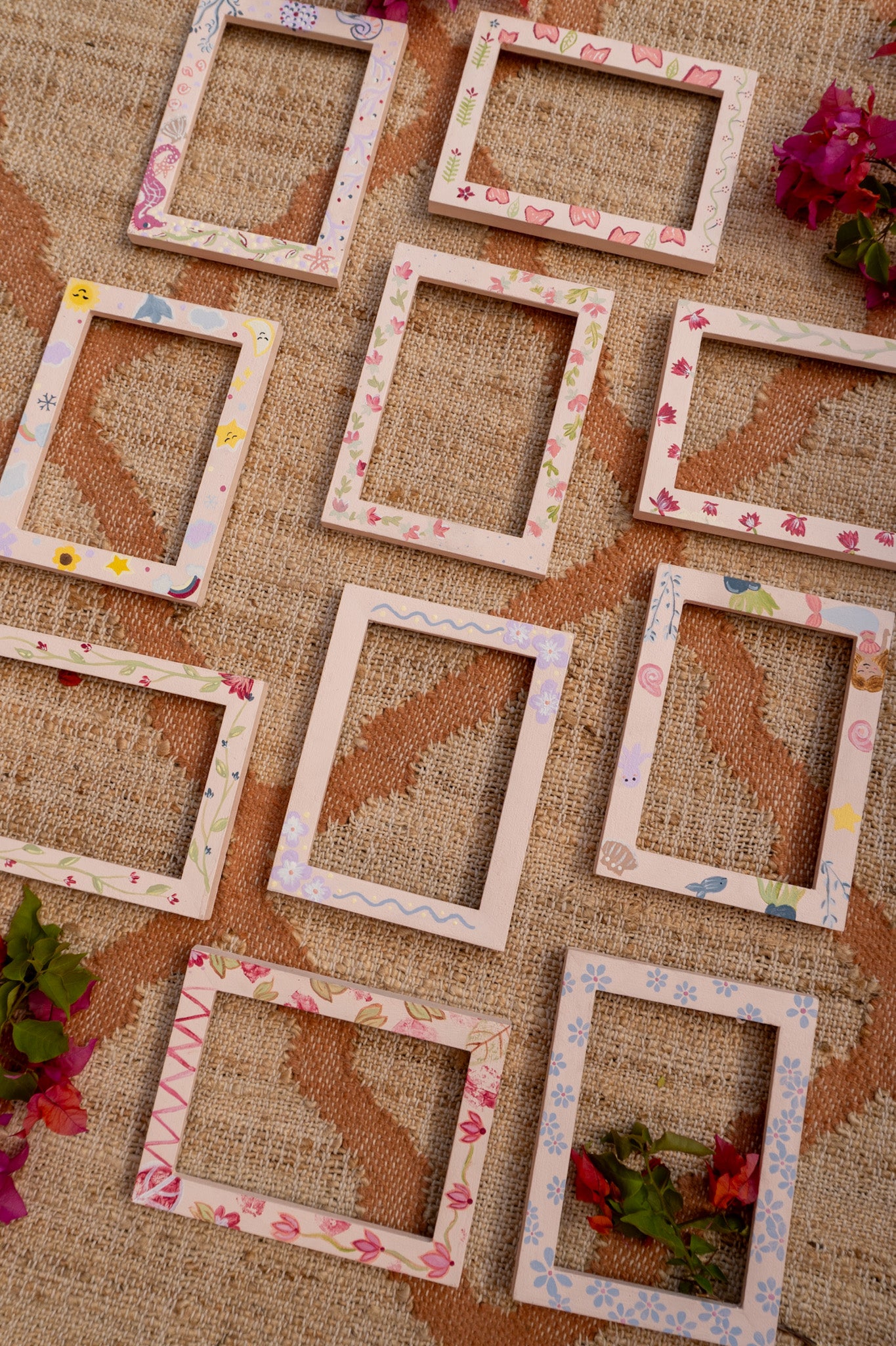 Decorative picture frames with floral patterns on a textured fabric background