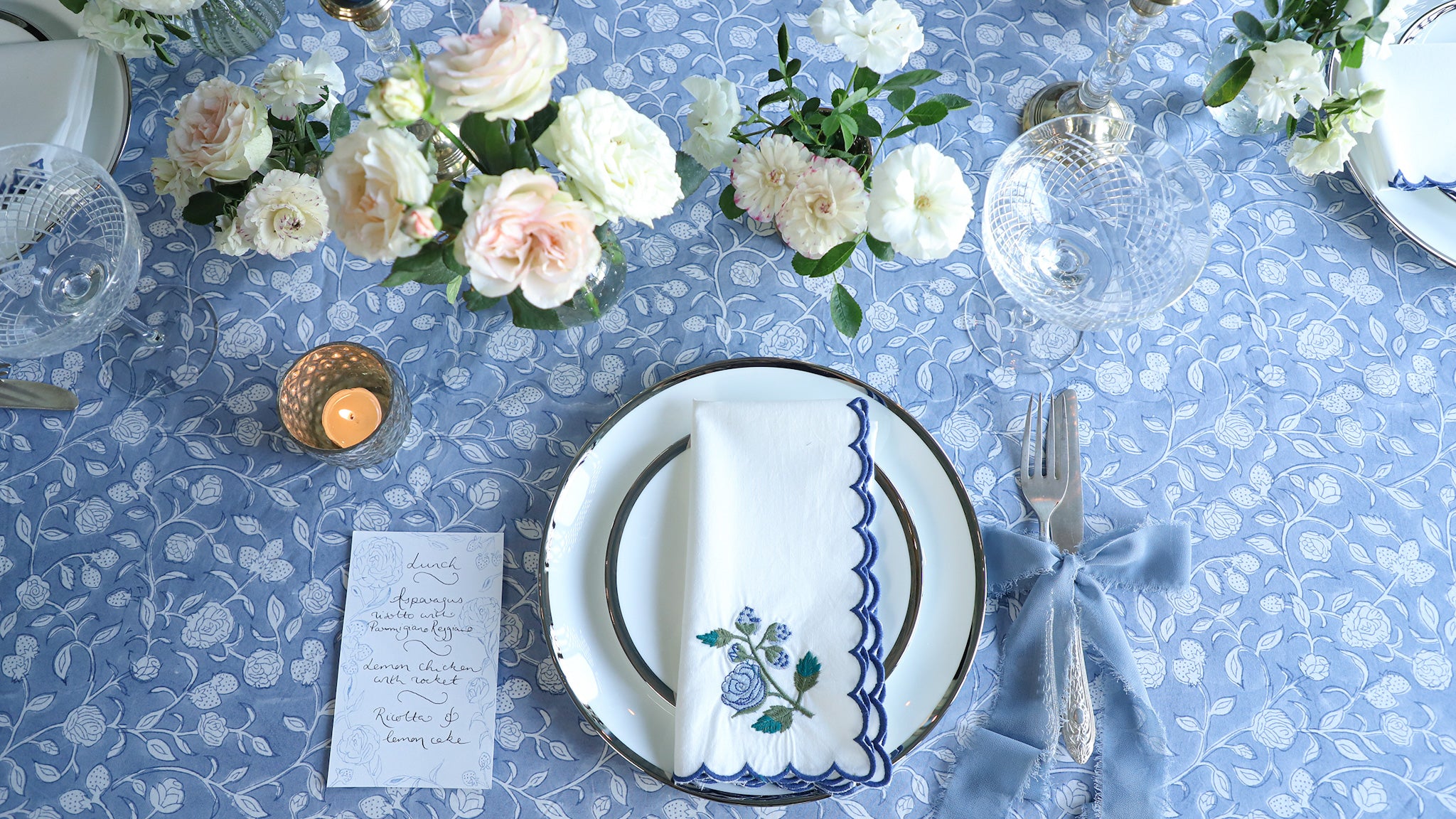 Blue roses and berries tablecloth and embroidered napkin