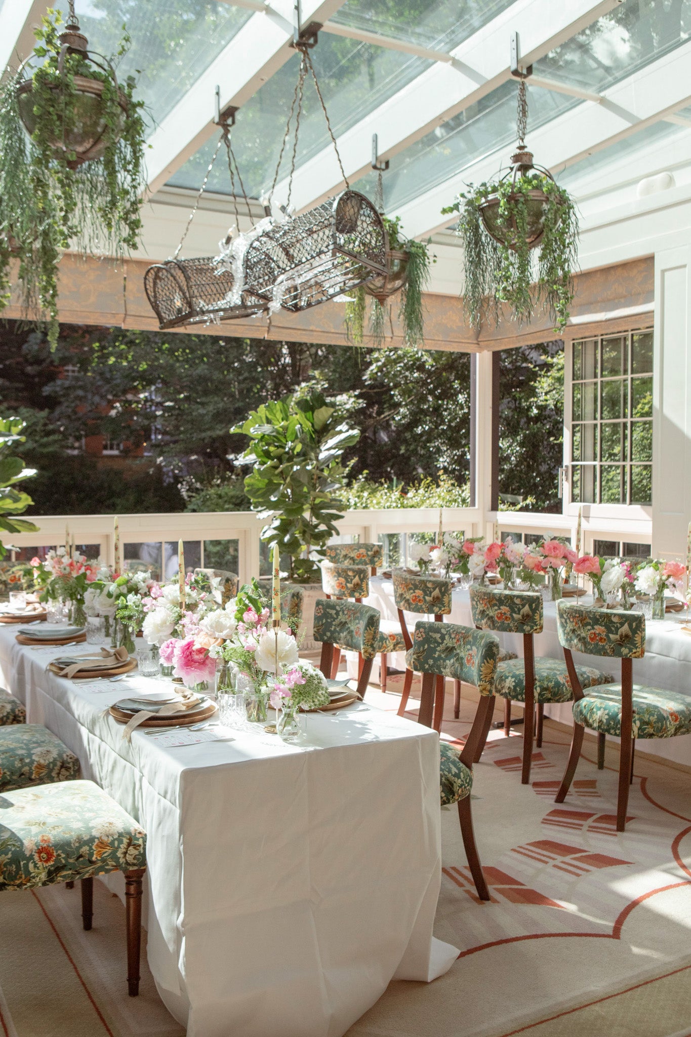Tables set for brunch with June flowers by Rosanna Falconer at The Goring