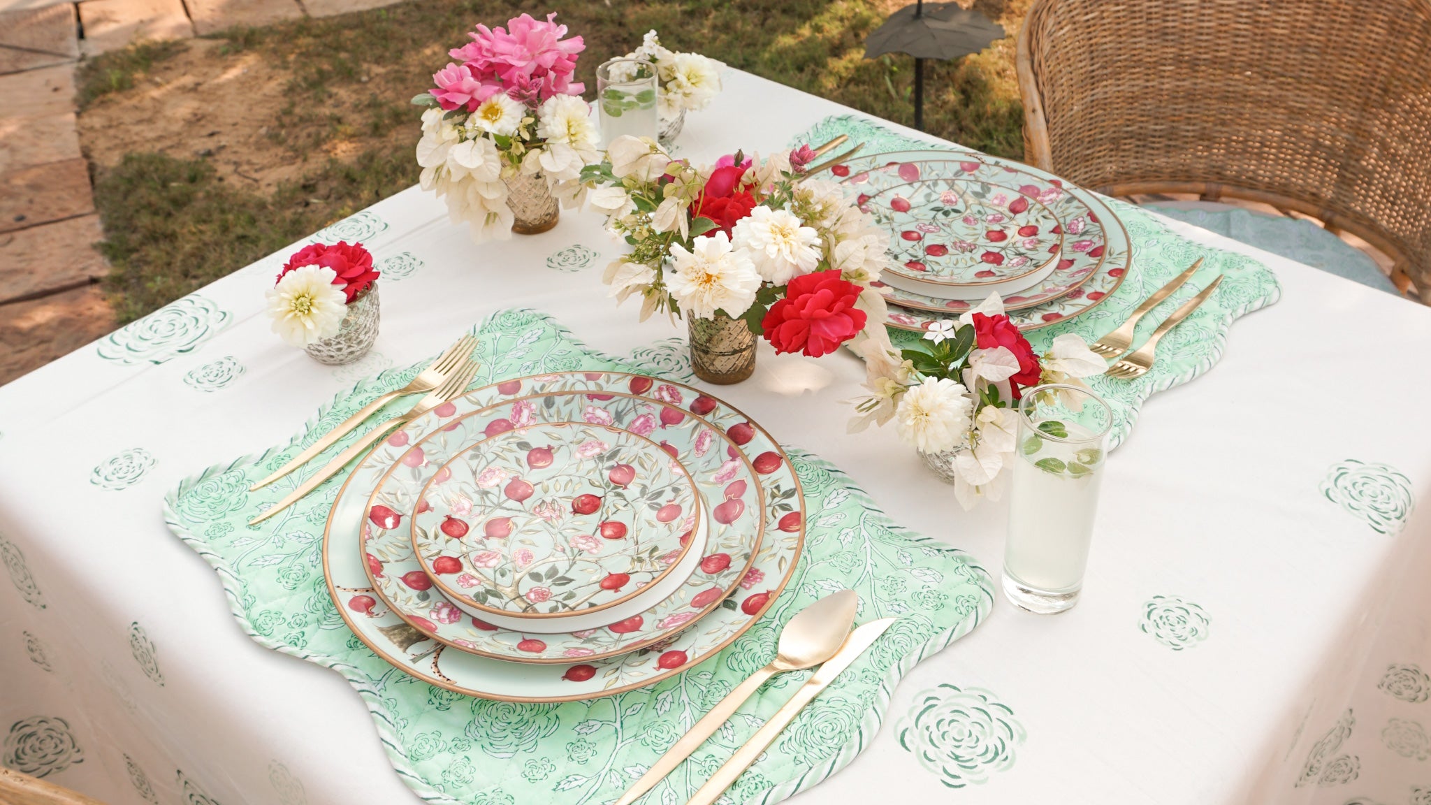 Rose Garden block printed quilted placemats on white rose tablecloth