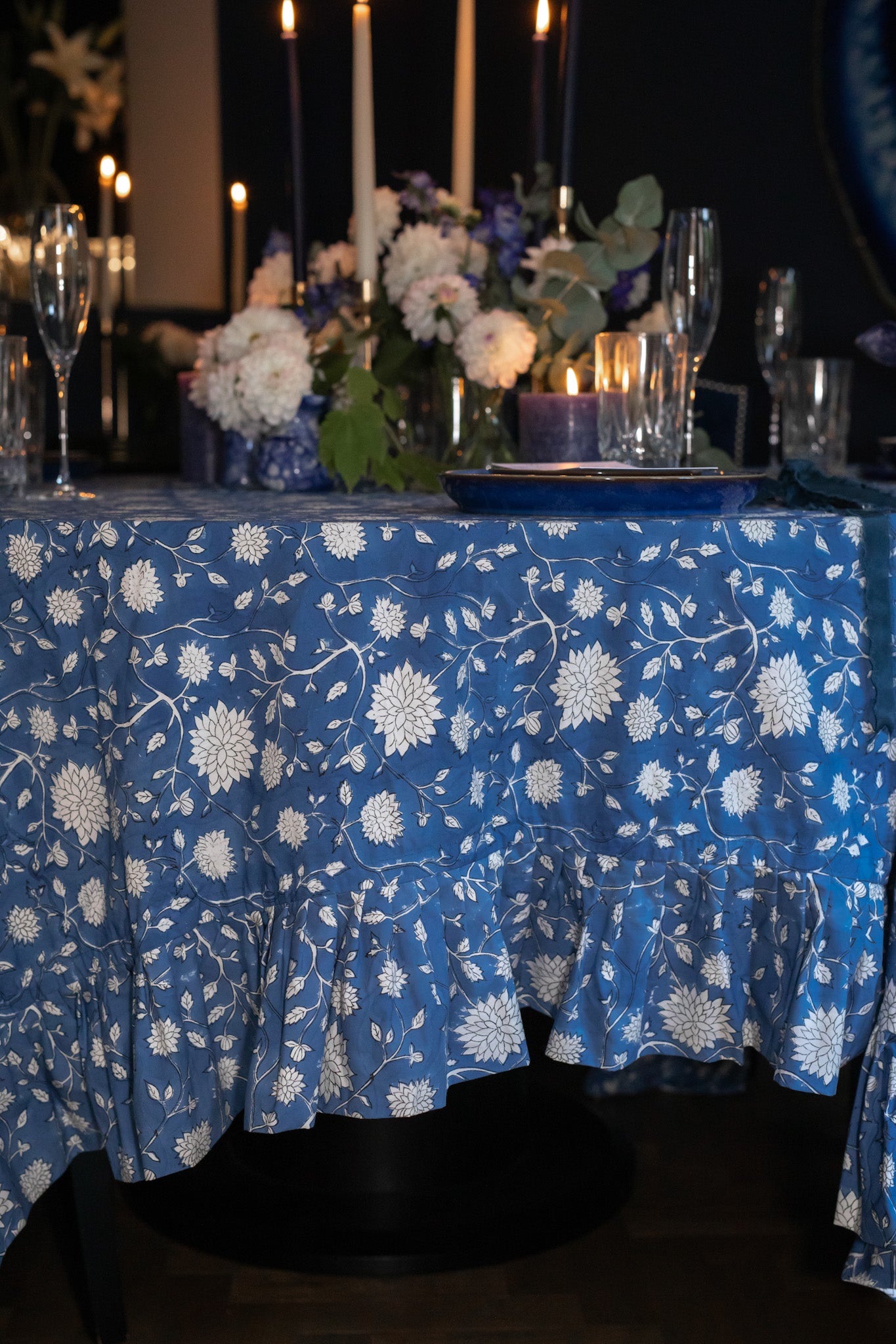 Ruffle hem on blue block printed tablecloth