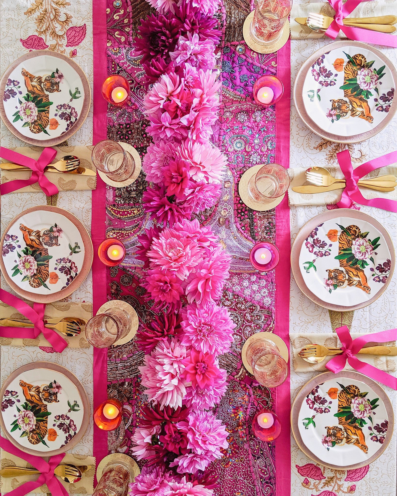 Tablescape by Rosanna Falconer in rani pink with tiger plates