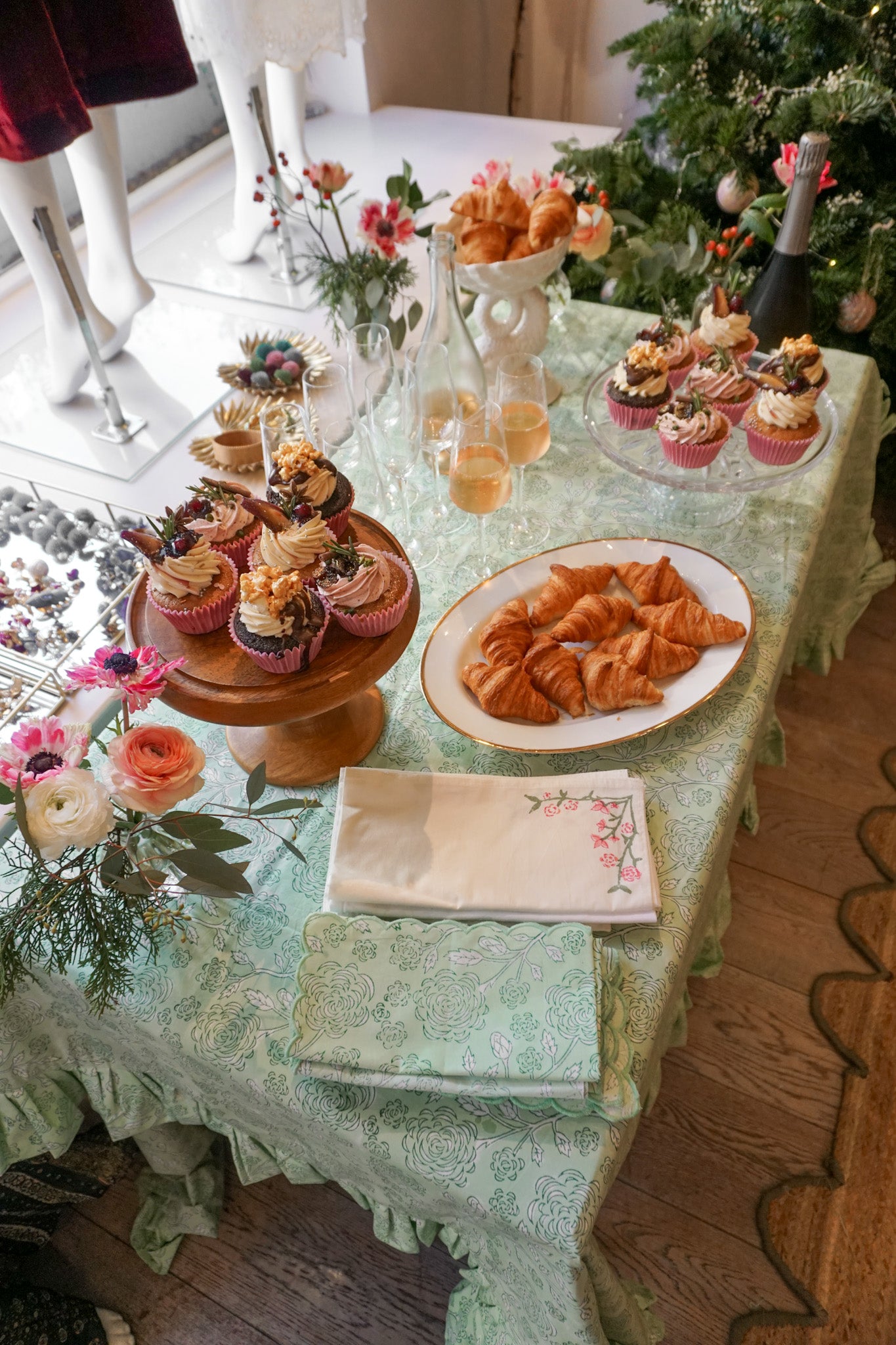 Tablescape with croissants and cupcakes