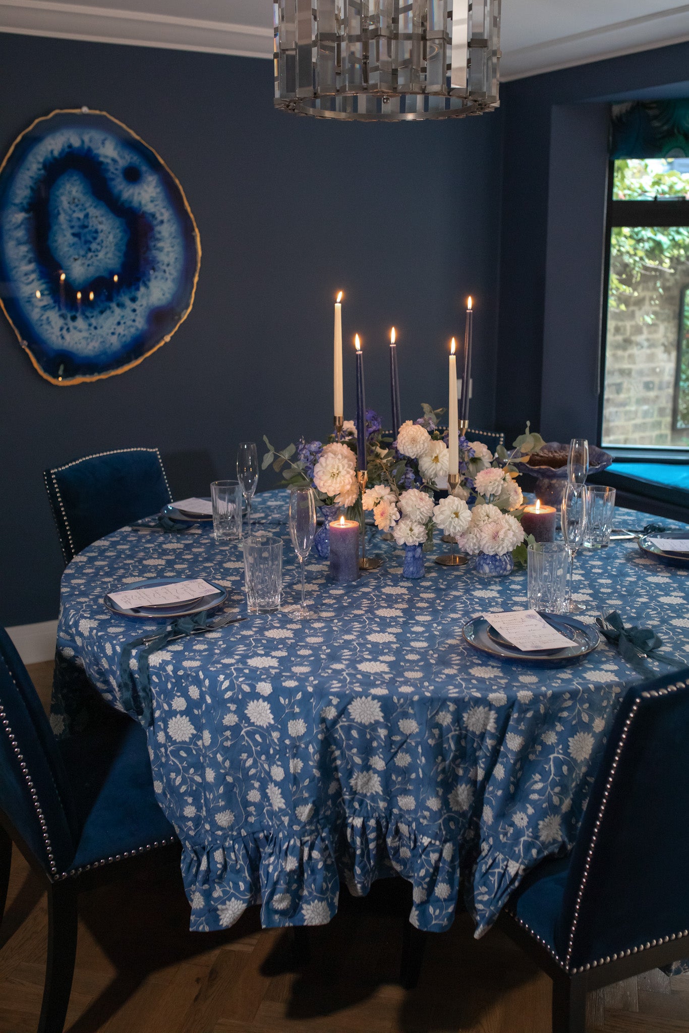 Table with blue blockprinted tablecloth dahlia jewel by Rosanna Falconer